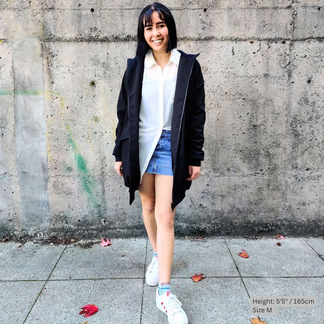 Swimmer (5'5" tall) wears a black swim parka in medium size over white blouse and blue denim skirt