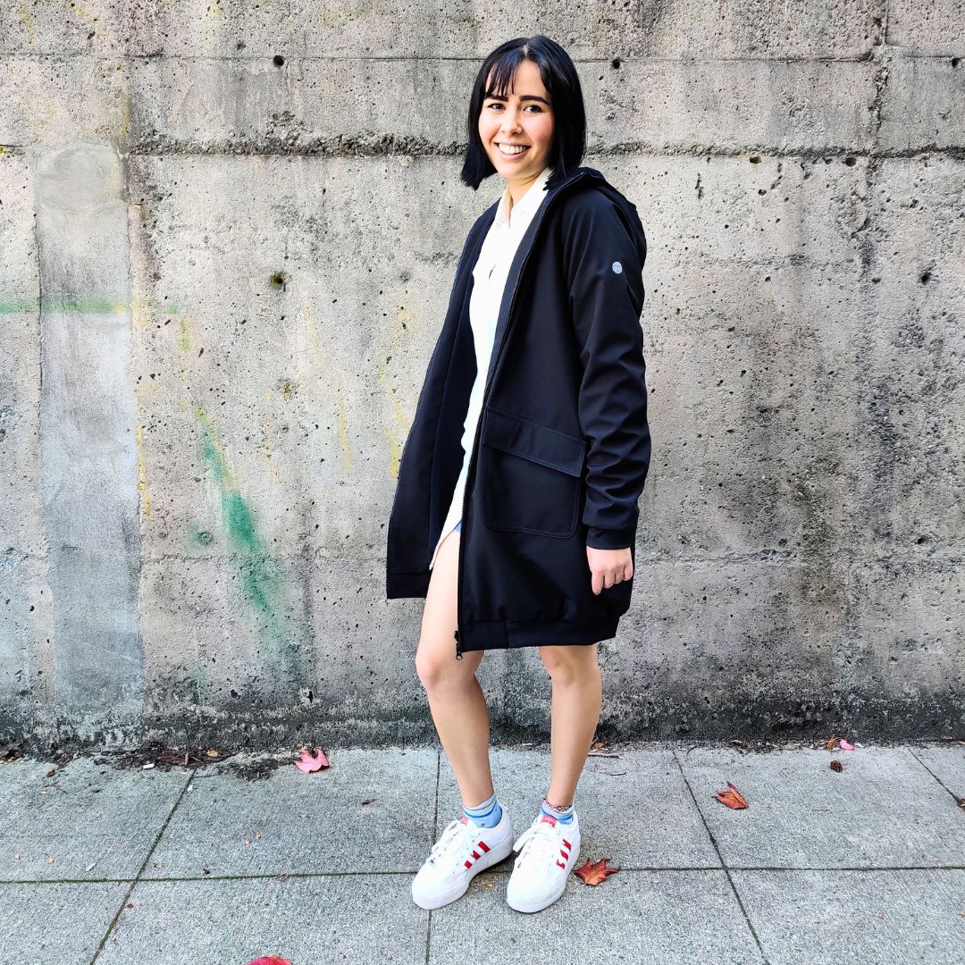 Swimmer (5'5" tall) wears a black swim parka in medium size over white blouse and blue jeans skirt