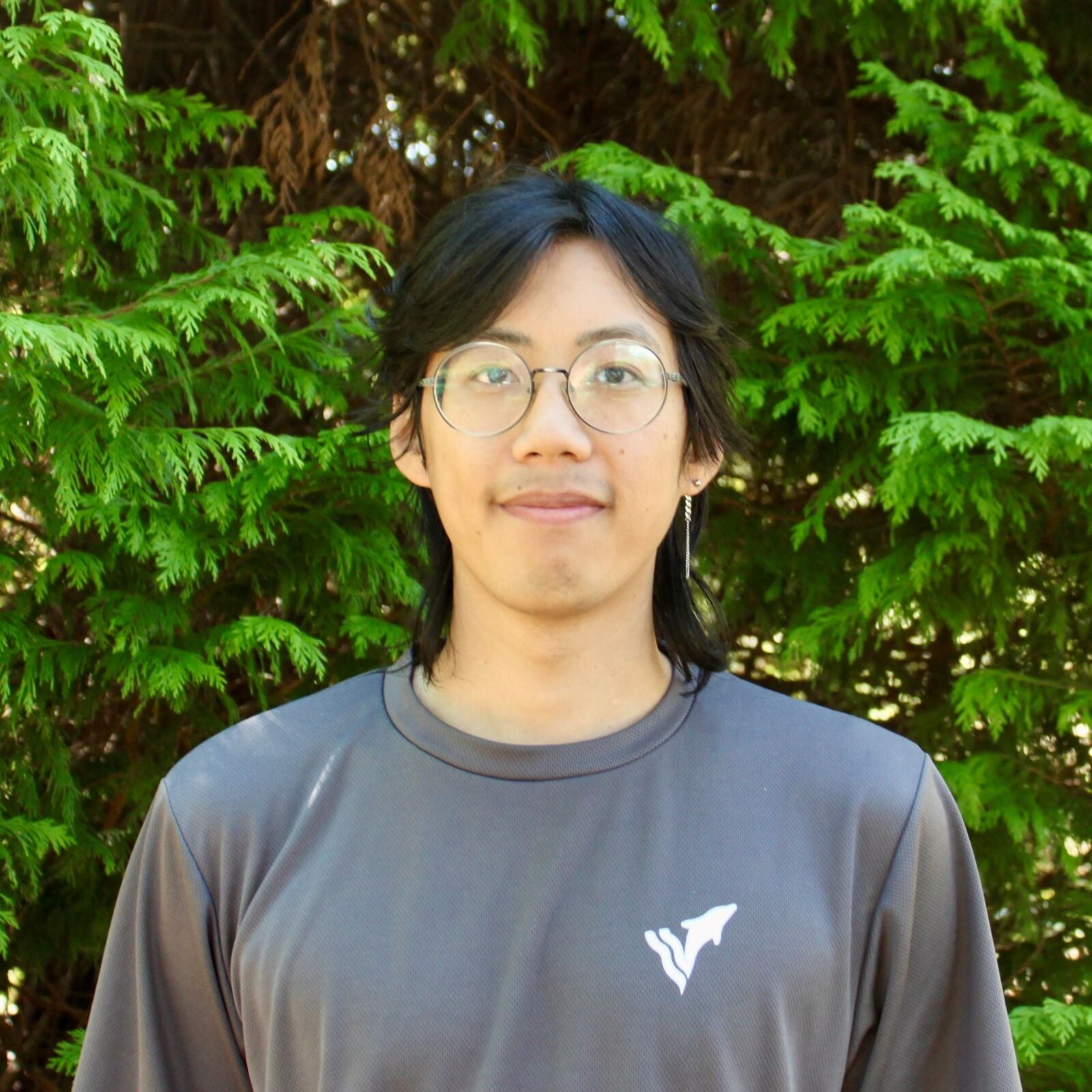 VPSC swim coach Kyle Cheng tests out Tingting's swim parka